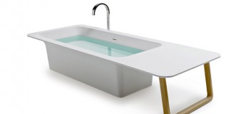 Baignoire îlot en solid surface avec une large plage latérale