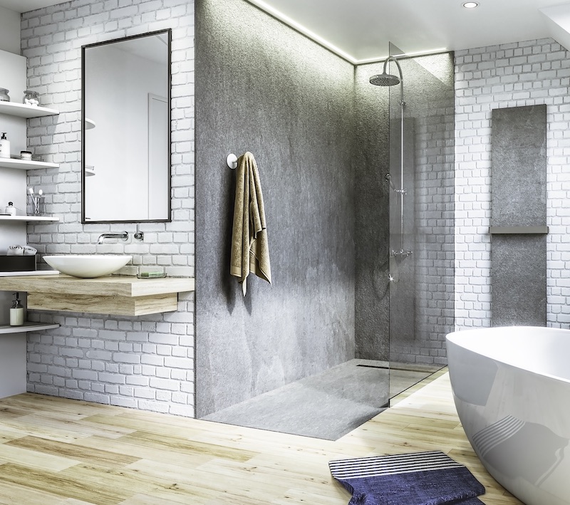 salle de bains avec douche revêtue de feuilles de pierre