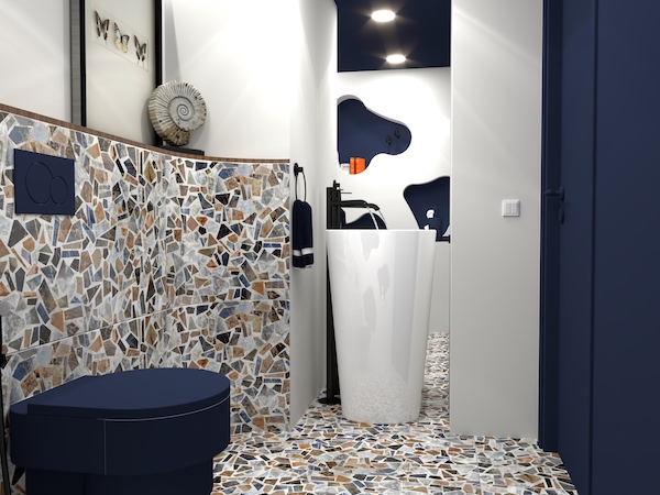 Toilettes avec un WC bleu intense et une vasque totem blanche en guise de lave-mains