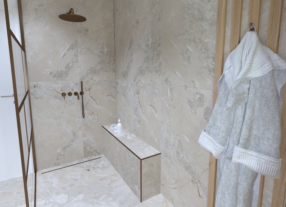 Douche à l'italienne avec un banc et un robinet encastré couleur bronze