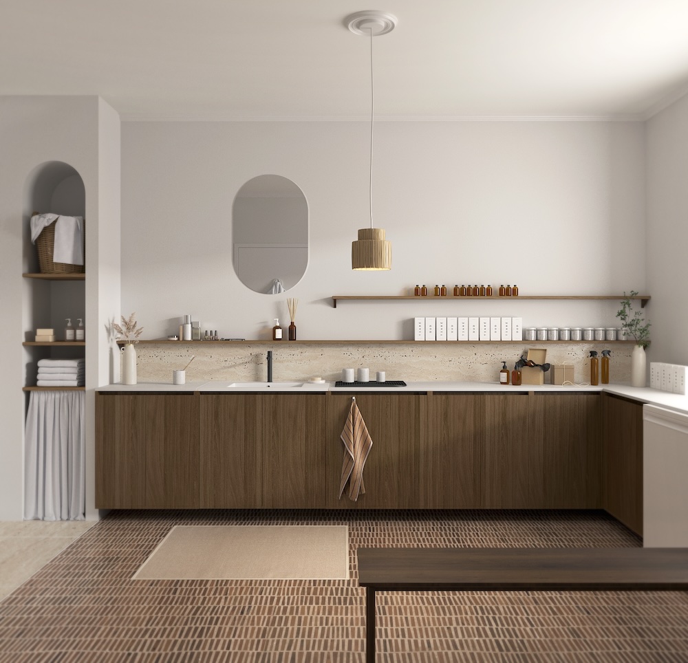 Le plan de travail et les rangements façon cuisine d'une salle de bains atelier de fabrication de cosmétiques.