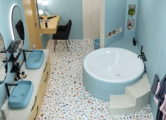 Une baignoire ronde dans un écrin de carreaux terrazzo inspiré des codes italiens Vue d'ensemble de la salle de bains avec baignoire ronde 3D Cup 2026